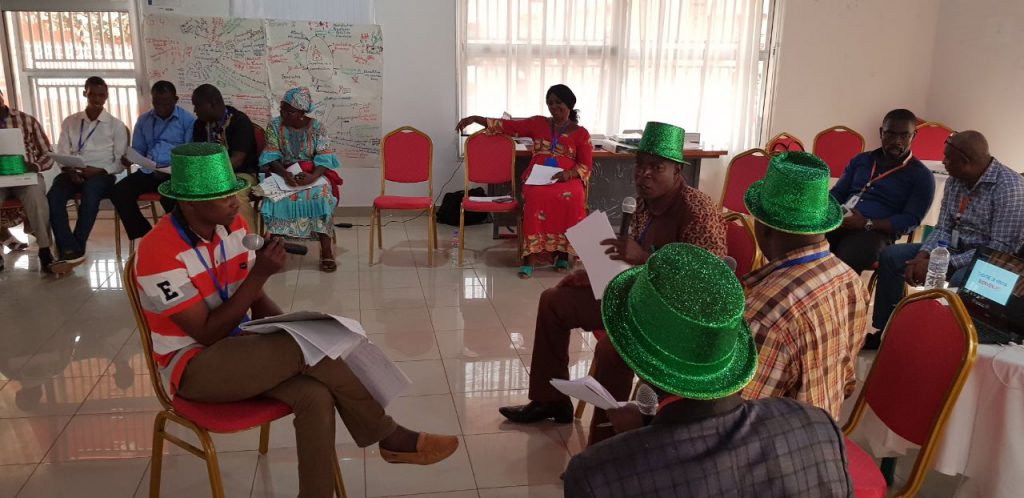 Supply chain managers are role-playing during the one-week training course on "Overview of Health Commodity Supply Chain Management (Guinea, 2018)