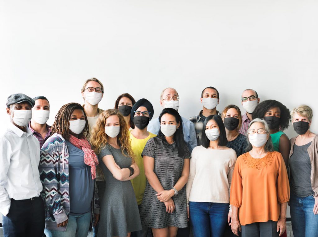 a-group-of-people-wearing-mask